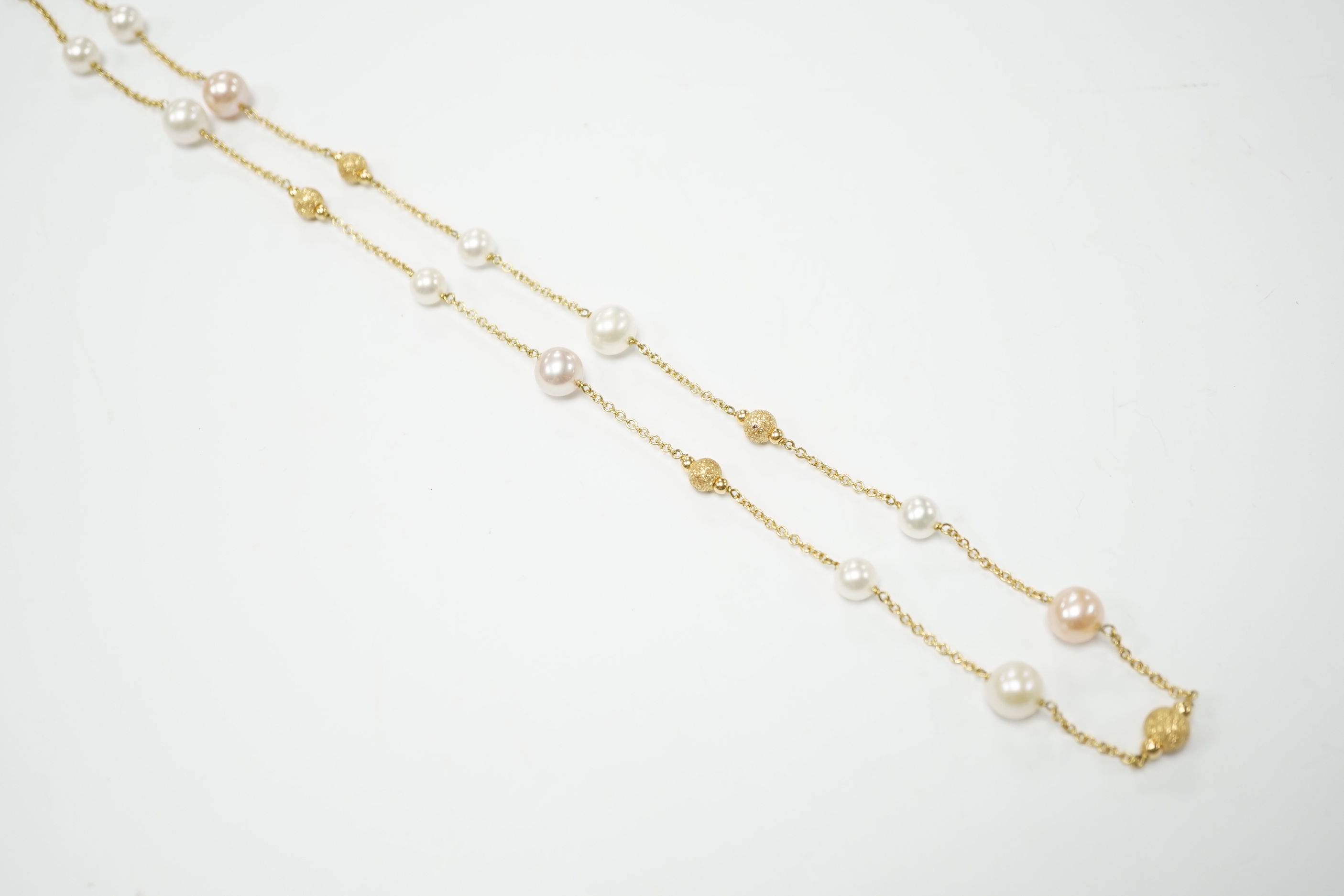 A modern Italian 18ct gold, twelve stone two colour cultured pearl and five gold sphere set necklace, 48cm, gross weight 13.4 grams.